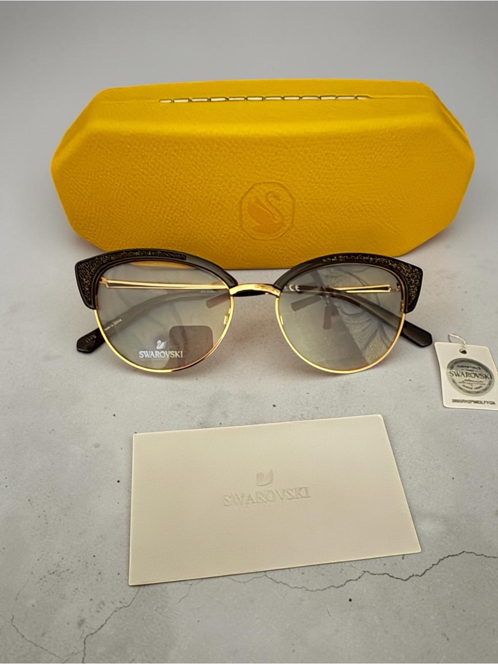 Swarovski Gold and Black Cat-Eye Sunglasses with Yellow Case New with Tag
